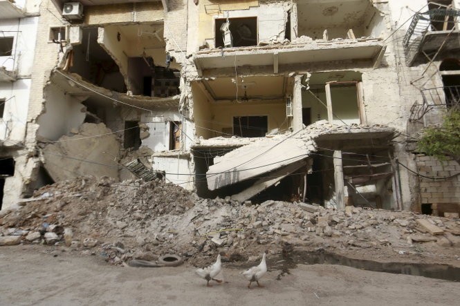 Thành phố Aleppo bị tàn phá nặng nề trong những đợt giao tranh - Ảnh: Reuters