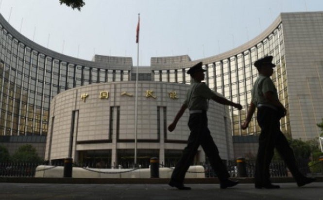 Ngân hàng Nhân dân Trung Quốc cắt giảm lãi suất lần thứ 6 với hi vọng hỗ trợ nền kinh tế đang suy giảm - Ảnh: AFP