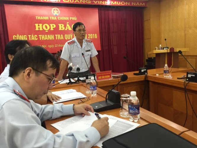 Ông Ngô Văn Khánh trả lời báo chí tại buổi họp báo