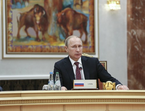 Tổng thống Putin trong cuộc đàm phán 4 bên tìm hướng giải quyết khủng hoảng Ukraine hôm 11/2 tại Minsk, Belarus. Ảnh: Reuters