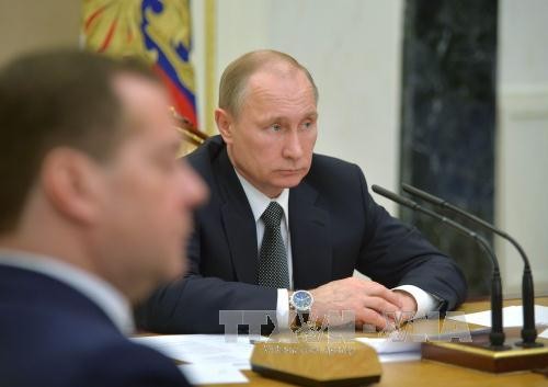 Tổng thống Vladimir Putin: Vụ sát hại ông Nemtsov mang động cơ chính trị. Ảnh: AFP/TTXVN