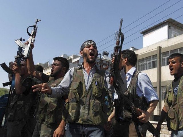 Các tay súng Al-Qaeda Syria ở thành phố Homs