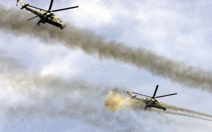 Trực thăng tấn công Nga yểm trợ lực lượng vũ trang Syria trong chiến đấu tấn công