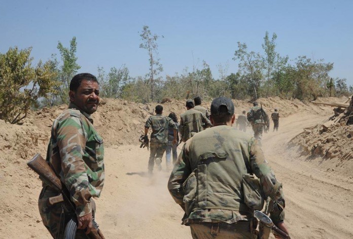 Binh sĩ lực lượng Vệ binh Cộng hòa tiến về thị trấn Khan al Sheih thuộc khu vực Tây Ghouta