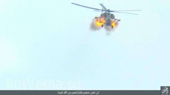 Trực thăng Mi-28 khai hỏa trên sa mạc Palmyra, ảnh từ trang Amaq của IS