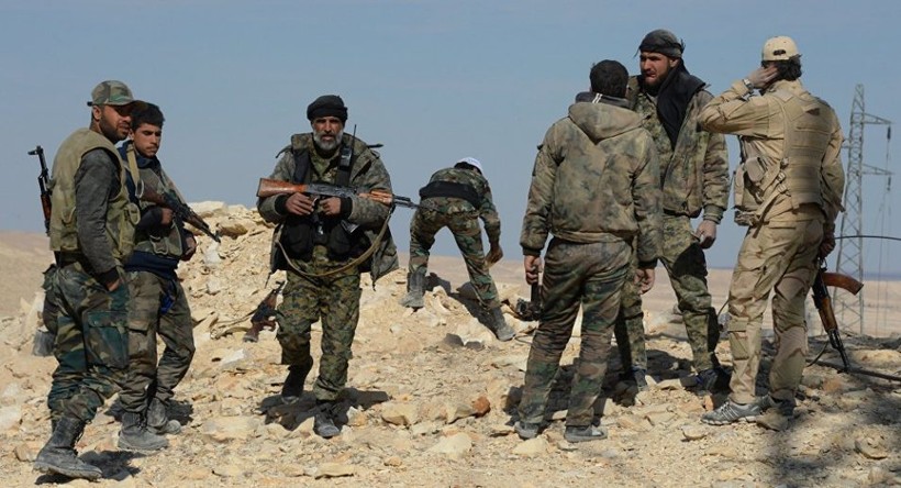 Binh sĩ quân đội Syria trên chiến trường Raqqa - ảnh minh họa của Masdar News