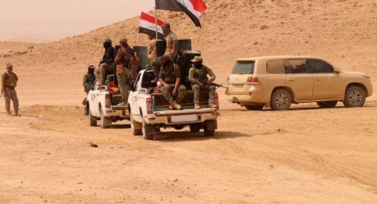 Quân đội Iraq tiến công IS trên vùng sa mạc thuộc tỉnh Anbar - ảnh Masdar News