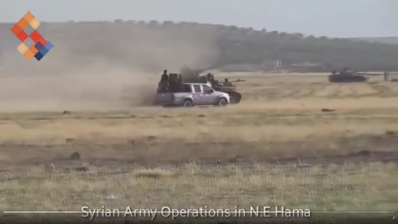 Một đơn vị quân đội Syria tiến công trên chiến trường đông bắc Hama - ảnh minh họa video  Syrian Digital Media‏