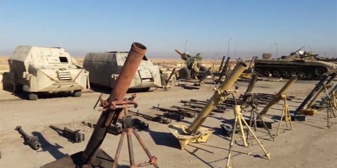 Kho vũ khí IS ở Deir Ezzor, ảnh minh họa video Masdar News