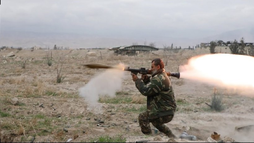Binh sĩ quân đội Syria chiến đấu trên chiến trường Đông Ghouta - ảnh minh họa Masdar News