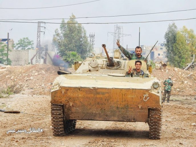 Các đơn vị Vệ binh Cộng hòa tiến công trên quận Al-Qadam, ngoại ô phía nam Damasscus. Ảnh truyền thông Al-Masdar News