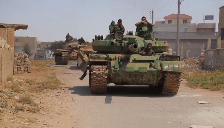 Xe tăng quân đội Syria trên chiến trường Daraa. Ảnh minh họa Masdar News