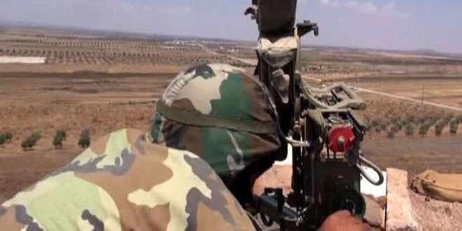 Binh sĩ quân đội Syria chiến đấu trên chiến trường Hama. Ảnh minh họa: SANA.