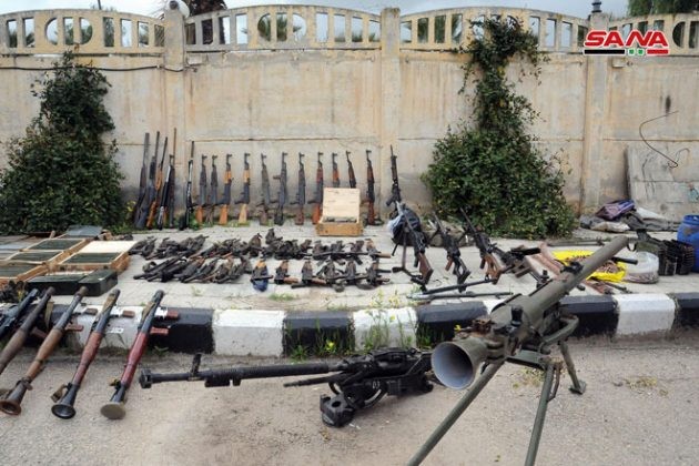Quân đội Syria thu vũ khí trang bị cất giấu bí mật của lực lượng Hồi giáo cực đoan ở SANA. Ảnh SANA