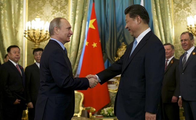 Tổng thống Nga Vladimir Putin (phải) và người đồng cấp Trung Quốc (ảnh tư liệu)