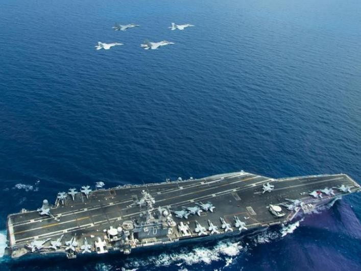 Cụm tấn công tàu sân bay USS Carl Vinson trên Biển Đông. Ảnh: AFP/News.com.au