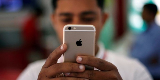 Ẩn sau mã độc hack iPhone từ xa là một tổ chức cực kỳ bí ẩn- ẢNH: AFP