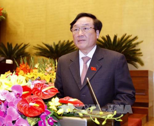 Viện trưởng VKSND Tối cao Nguyễn Hòa Bình trình bày báo cáo nhiệm kỳ 2011-2016 tại Quốc hội chiều 22-3 Ảnh: TTXVN