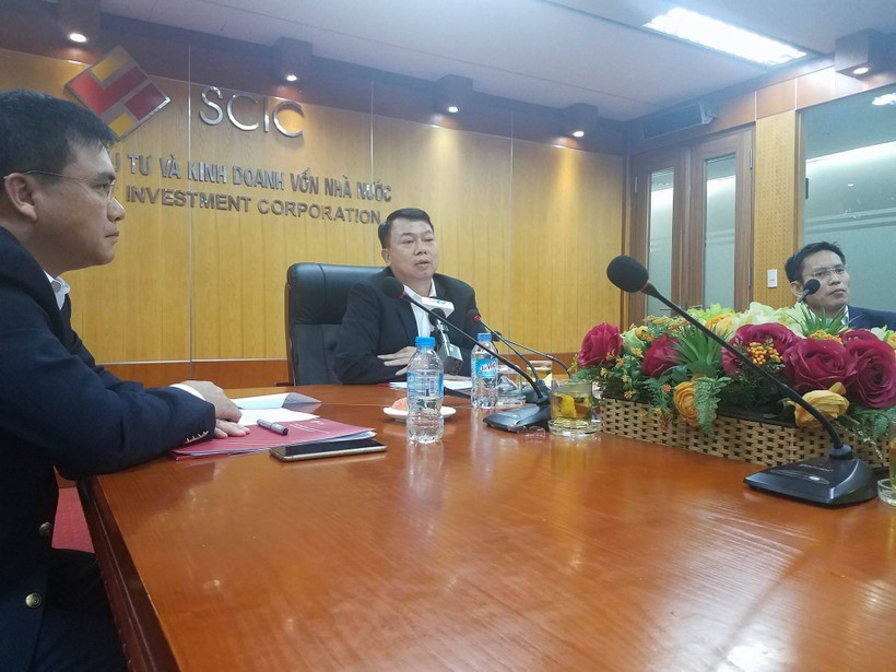 Chủ tịch SCIC Nguyễn Đức Chi và hai P.TGĐ Nguyễn Chí Thành (trái), Nguyễn Hồng Hiển (phải) trong buổi họp báo sáng 16/10. (Ảnh: X.T)