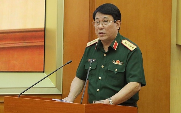 Đại tướng Lương Cường trình bày báo cáo tại hội nghị.