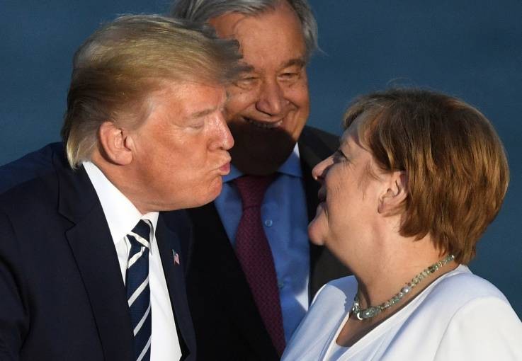 Tổng thống Trump trong cuộc gặp Thủ tướng Merkel tại Hội nghị thượng đỉnh G7 vừa qua (Ảnh: Newsweek)