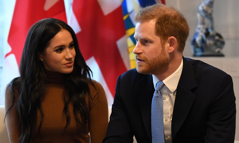 Vợ chồng Hoàng tử Harry trong một chuyến thăm Canada (Ảnh: Guardian)