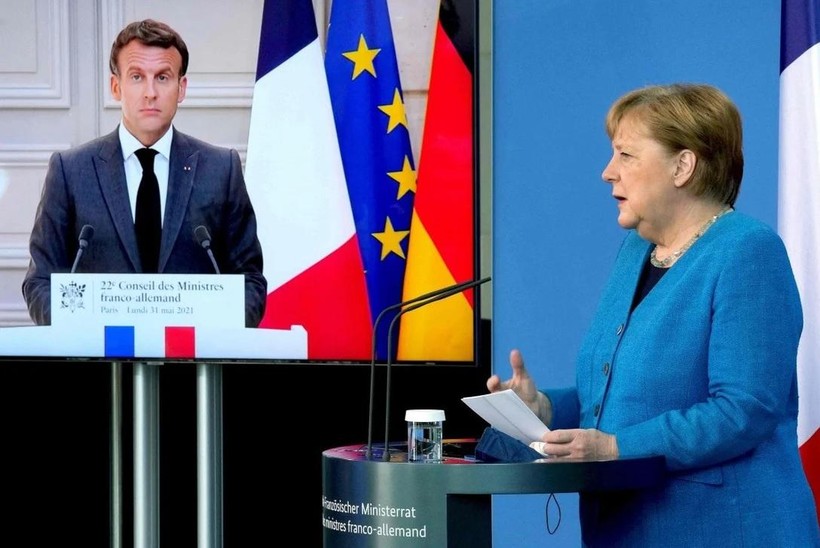 Tổng thống Pháp Emmanuel Macron và Thủ tướng Đức Angela Merkel kêu gọi lời giải thích về vụ bê bối do thám (Ảnh: AFP)