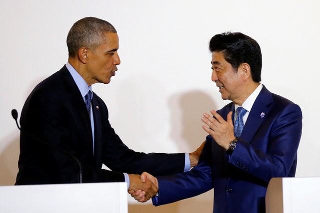 Tổng thống Mỹ Barack Obama và Thủ tướng Nhật Bản Shinzo Abe - Ảnh: Reuters