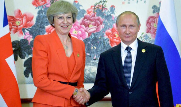 Thủ tướng Anh Theresa May và Tổng thống Nga Putin.
