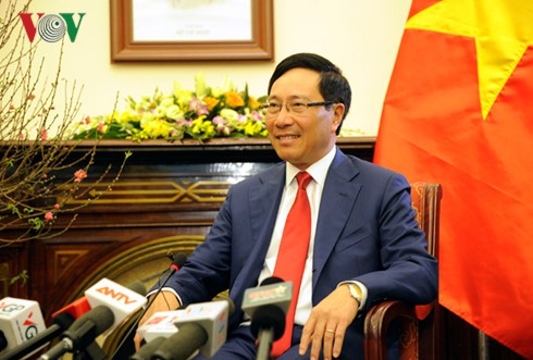 Phó Thủ tướng, Bộ trưởng Ngoại giao Phạm Bình Minh tại cuộc gặp mặt báo chí đầu năm 2017.