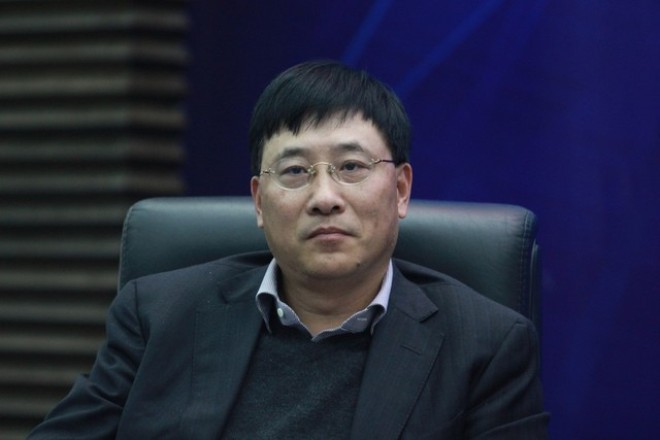  Nhiếp Khánh Bình - Tổng giám đốc công ty tài chính chứng khoán tại một hội nghị chuyên đề tại Vũ Hán. (Ảnh: Imaginechina)