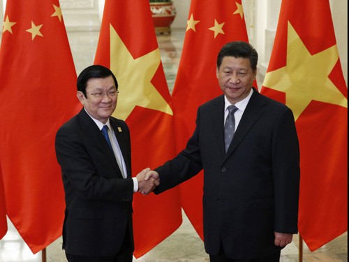 Chủ tịch nước Việt Nam Trương Tấn Sang và Chủ tịch Trung Quốc Tập Cận Bình trong cuộc gặp gỡ tại Hội nghị cấp cao APEC diễn ra ở Bắc Kinh tháng 11-2014 - Ảnh: Reuters.