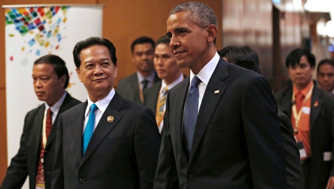Tổng thống Mỹ Barack Obama và Thủ tướng Nguyễn Tấn Dũng tại hội nghị thượng đỉnh ASEAN - Mỹ ở Malaysia. Tổng thống Mỹ đã nhận lời mời của Thủ tướng Nguyễn Tấn Dũng, sẽ thăm Việt Nam vào năm 2016 - Ảnh: Reuters