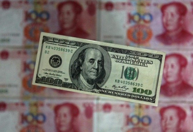 Trung Quốc đang tìm cách giảm vai trò của đồng USD trên thị trường tài chính quốc tế. Ảnh: Reuters 