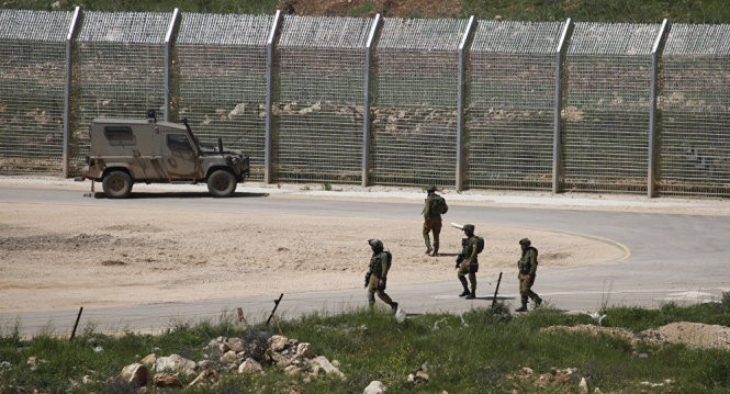 Quân đội Israel trong khu vực chiếm đóng ở cao nguyên Golan - Ảnh: AFP