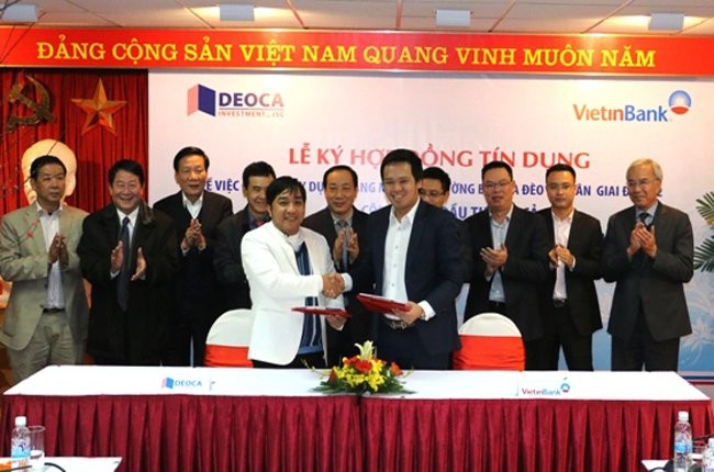 Lễ ký kết vay vốn mở rộng hầm đường bộ Hải Vân giữa Công ty cổ phần Đầu tư Đèo Cả và Ngân hàng Vietinbank - Ảnh: Bộ GTVT.