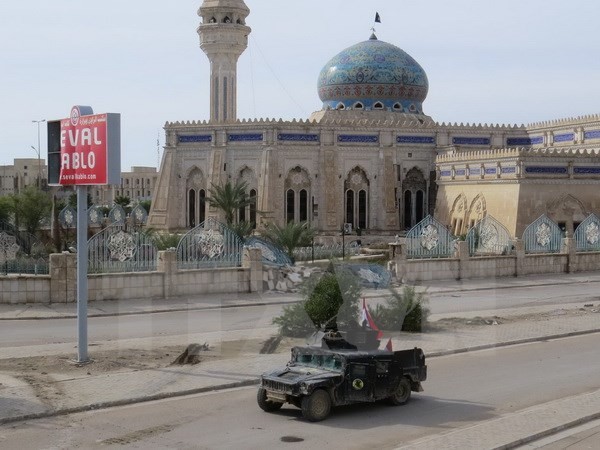 Lực lượng an ninh Iraq tuần tra tại trung tâm thành phố Ramadi, tỉnh Anbar ngày 8/1, sau khi giành lại quyền kiểm soát thành phố này từ IS ngày 1/1 vừa qua. (Nguồn: AFP/TTXVN)