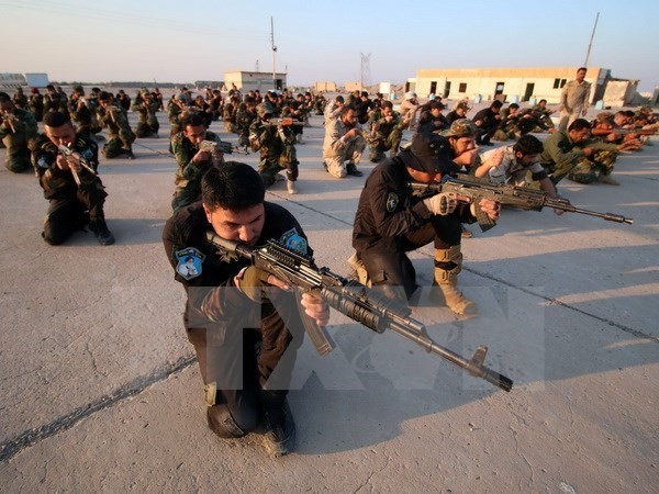 Lực lượng tự vệ Iraq tham gia cuộc diễn tập quân sự ở al-Zubair, gần thành phố miền nam Basra ngày 13/2. (Nguồn: AFP/TTXVN)