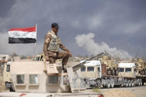 Binh sĩ Iraq tham gia chiến dịch giành lại nhà máy lọc dầu Baiji từ IS. Ảnh: AFP/TTXVN