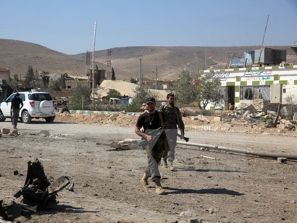 Binh sỹ Syria làm nhiệm vụ tại thị trấn Khanasser, Aleppo. (Nguồn: AFP/TTXVN)