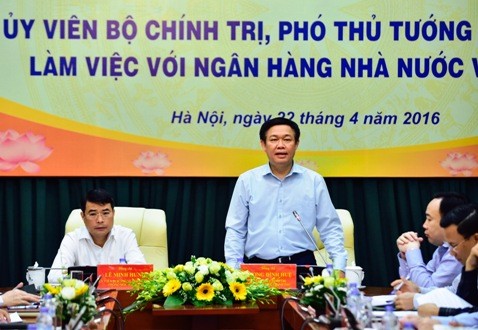 Phó Thủ tướng Chính phủ Vương Đình Huệ chủ trì cuộc họp về triển khai Nghị quyết số 01/2016/NQ-CP của Chính phủ, hoạt động ngân hàng, thị trường tiền tệ và các nhiệm vụ trọng tâm của Ngân hàng Nhà nước Việt Nam năm 2016 (Ảnh: Nhật Bắc - VGP)